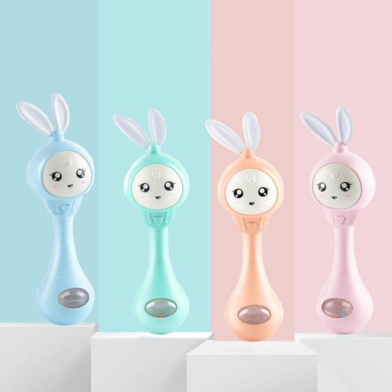 جغجغه ناب سل مدل دستی دندان گیر چراغدار موزیکال خرگوش بامزه  کد Funny rabbit teething hand rattle