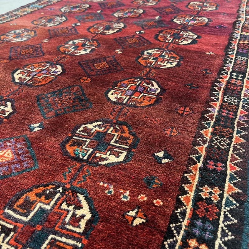 فرش دستبافت دو متری مدل بلوچ کد Nkpa.ha.f30 زمینه قرمز