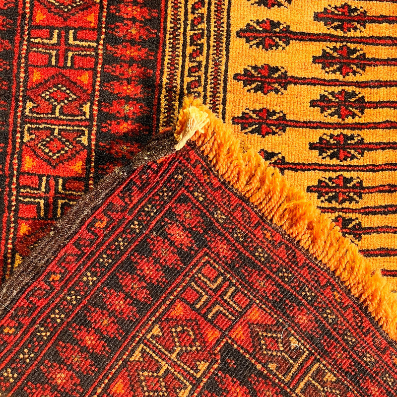 فرش دستبافت کناره طول یک و نیم متر مدل بلوچ کد NKP.RJ54 زمینه قرمز