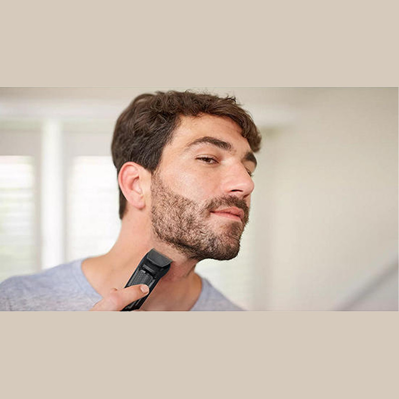 ماشین اصلاح موی سر و صورت فیلیپس مدل MG371015 با تیغه استیل ضد زنگ خودتیزشونده، باتری قابل شارژ با 60 دقیقه استفاده بی‌سیم، طراحی ارگونومیک و قابلیت اصلاح خط زن و حجم زن همراه با تریمر گوش و بینی