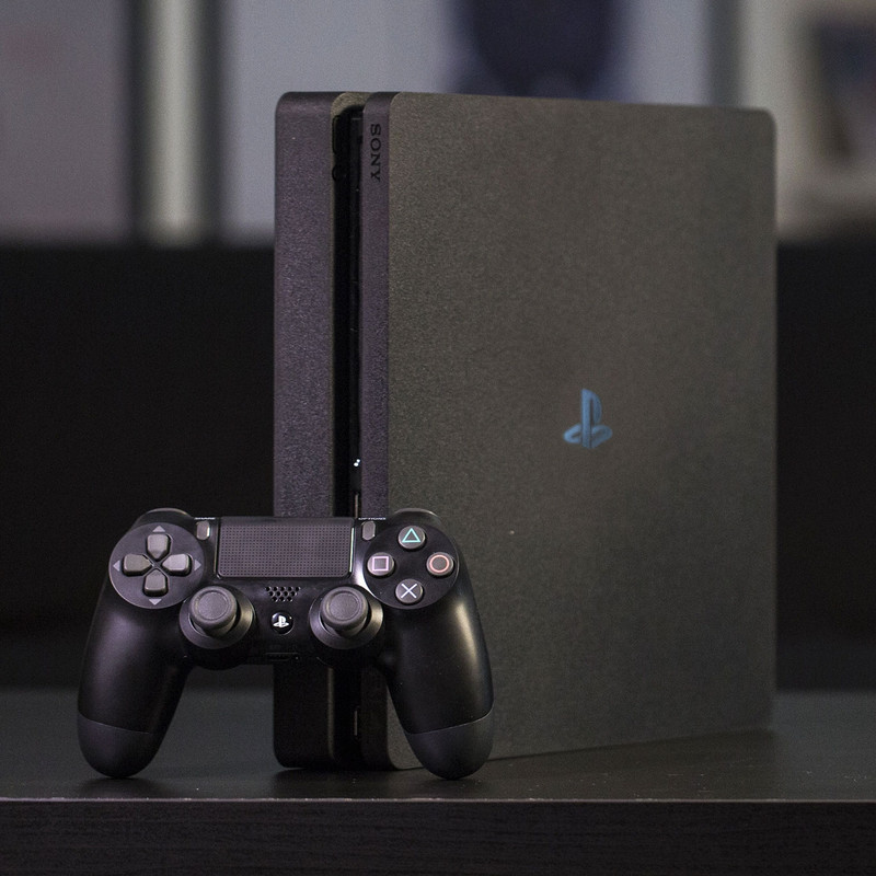 کنسول بازی سونی مدل Playstation 4 Slim ریجن 3 سری CUH-2218B ظرفیت 1 ترابایت به همراه کارت نصب 20 عدد بازی
