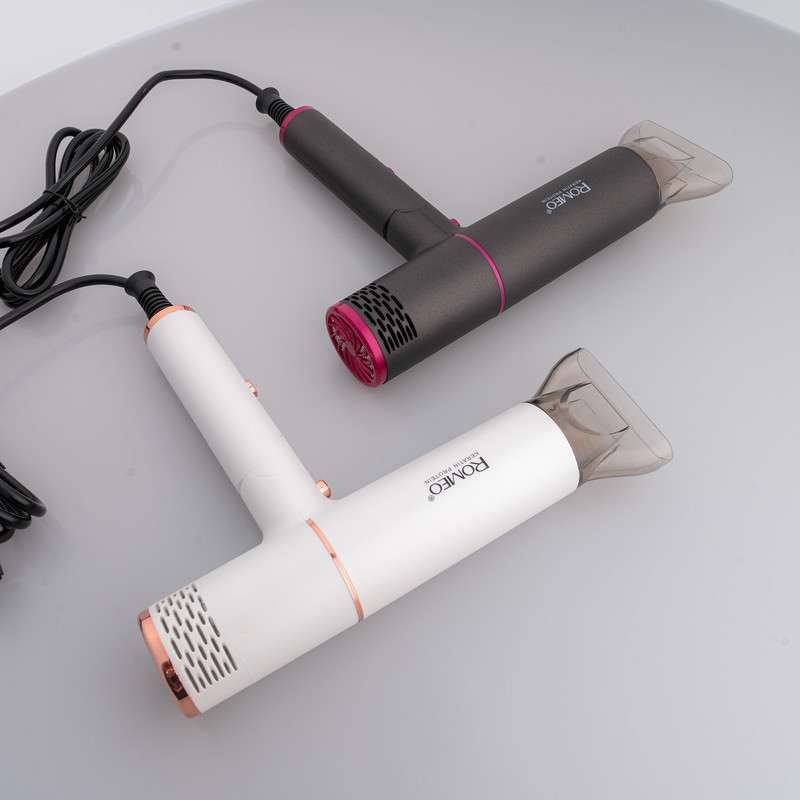 سشوار حرفه‌ای 2000 وات رومئو مدل RM-5656، موتور AC، وزن 600 گرم، المنت سرامیک تورمالین، دارای سری متمرکز‌کننده باریک با ویژگی صاف‌کنندگی، با قابلیت باد سرد