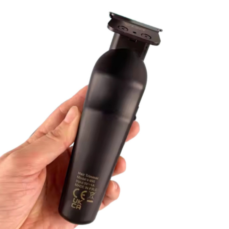 ماشین اصلاح موی سر و صورت وی جی آر مدل V-995 با تیغه کربن استیل، باتری لیتیوم یون 2000 میلی‌آمپر ساعت، شارژ USB، قابلیت تنظیم سرعت و طراحی ارگونومیک و سبک