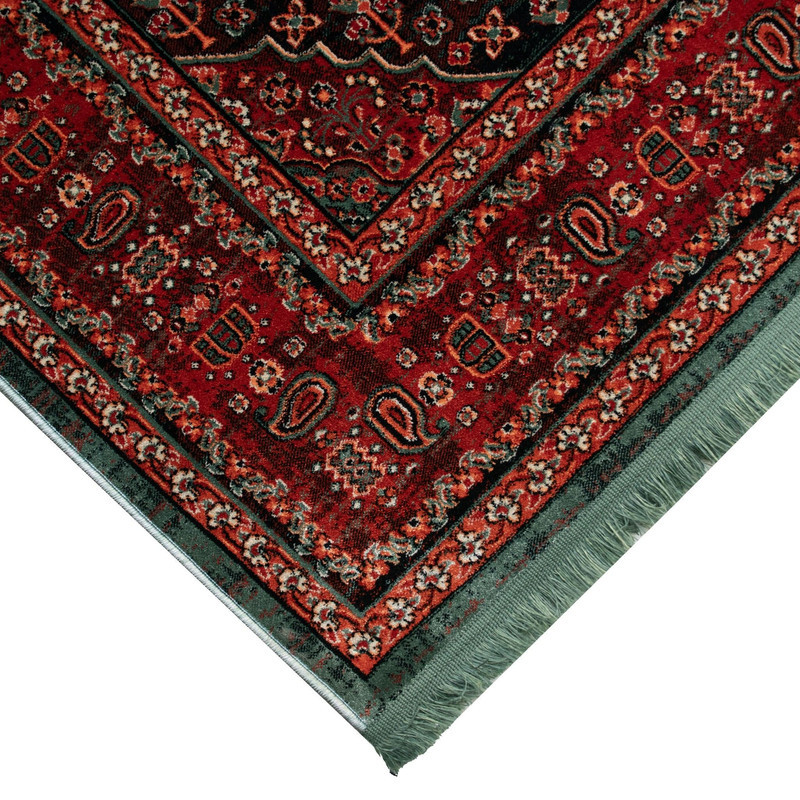 فرش ماشینی 700 شانه فرش ابریشمی کرامتیان زمینه سبز حاشیه لاکی مدل طرح سرو جاودان کد 5106B