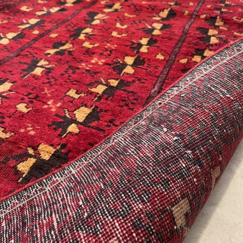 فرش دستبافت دو متری مدل بلوچ کد Nkpa.ha.f28 زمینه قرمز