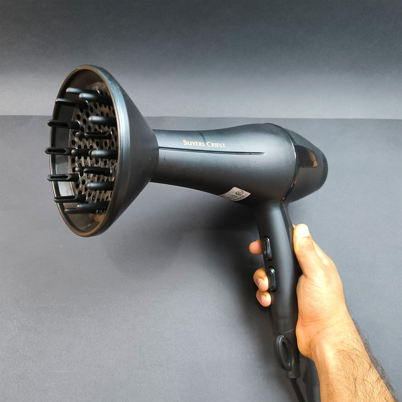 سشوار سیلور کرست مدل SC-D013 با موتور AC، توان 5000 وات، فناوری تولید یون، تنظیم دما و سرعت در 2 حالت و همراه با دیفیوزر و نازل متمرکزکننده