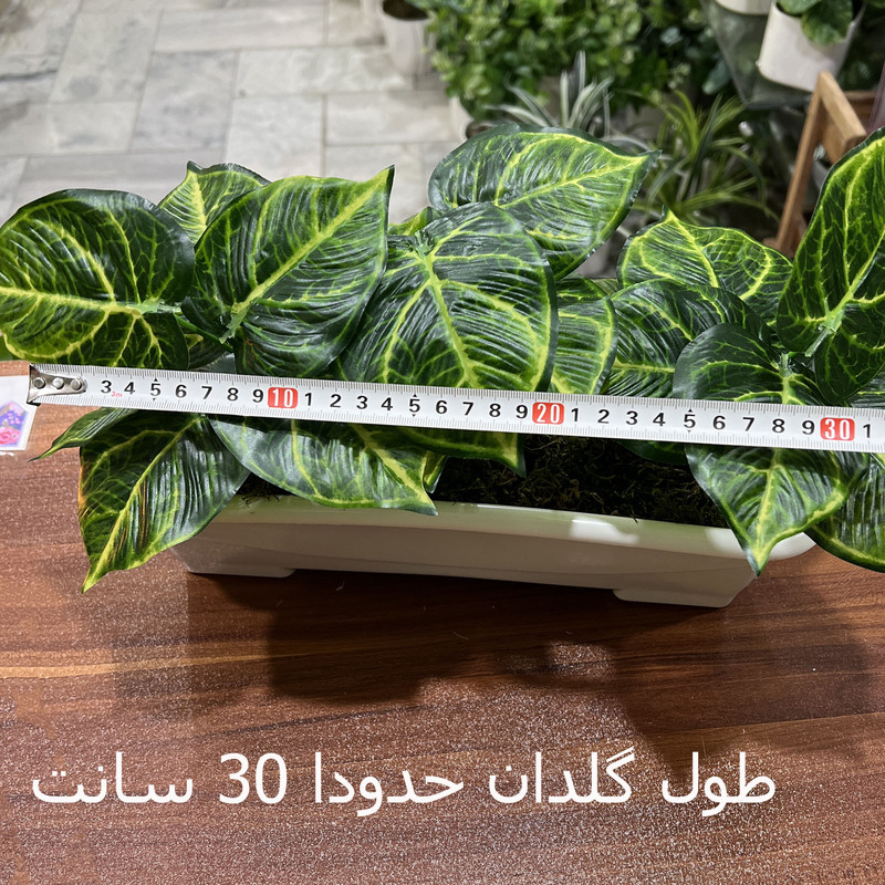 گلدان مستطیلی به همراه گل مصنوعی 3 بوته، ابعاد 30×10×15 سانتی‌متر، وزن 300 گرم