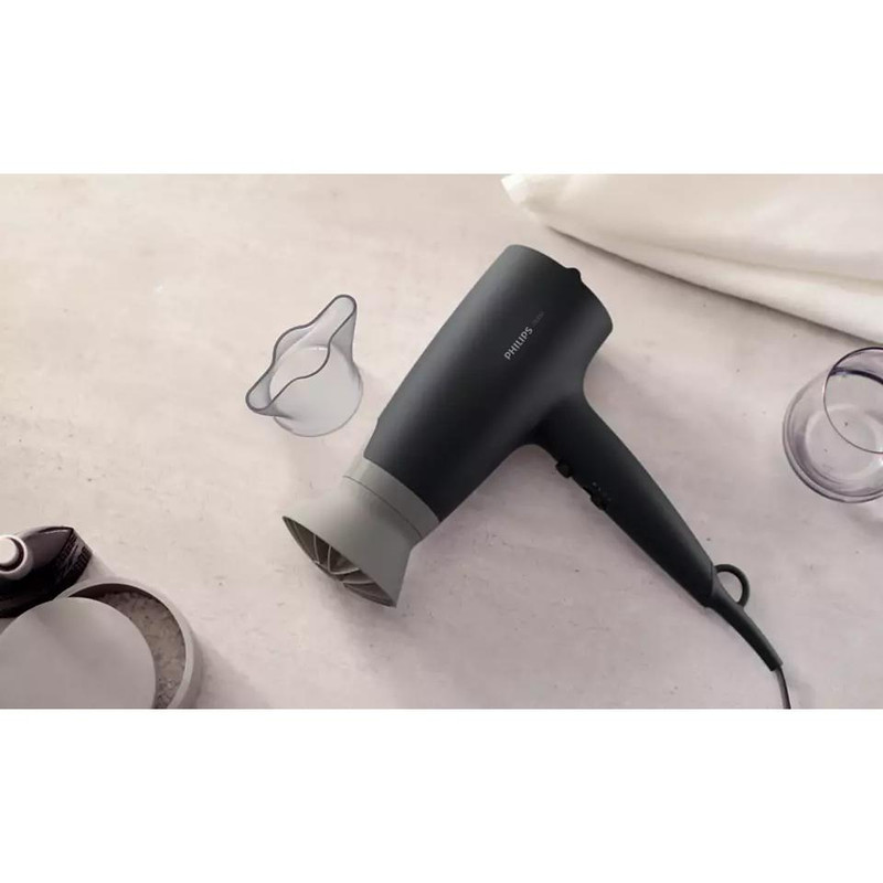 سشوار حرفه‌ای 2100 وات فیلیپس مدل BHD351، موتور DC، وزن 500 گرم، المنت سرامیک، دارای سری متمرکز‌کننده باریک با ویژگی صاف‌کنندگی، حجم‌دهندگی، با قابلیت باد سرد