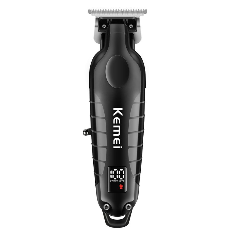 ماشین اصلاح موی سر و صورت کیمی مدل KM-2293 با تیغه کربن استیل خودتیز شونده، موتور 6000 دور در دقیقه، طراحی ارگونومیک، شانه قابل تنظیم 1 تا 3 میلی‌متر و باتری 1200 میلی‌آمپر ساعت با شارژ و عملکرد 180 دقیقه‌ای