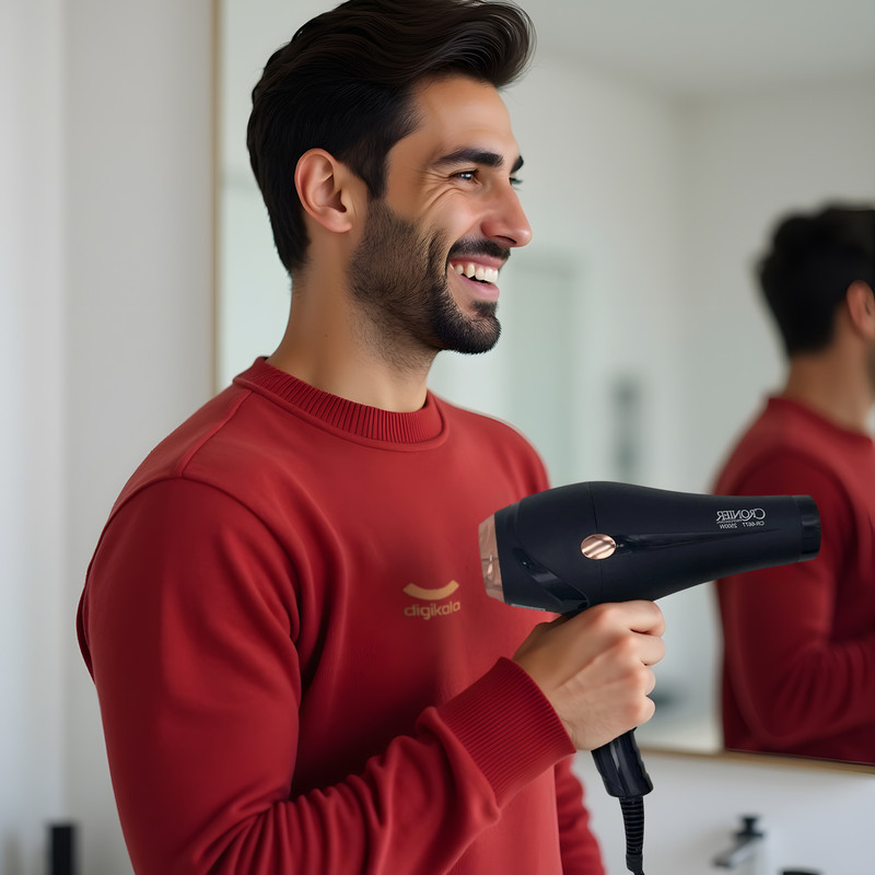 سشوار خانگی 2500 وات کرونر مدل CR-6677، موتور AC، وزن 540 گرم، دارای سری متمرکز‌کننده باریک، متمرکز‌کننده پهن با ویژگی صاف‌کنندگی، حجم‌دهندگی، با قابلیت فناوری تولید یون