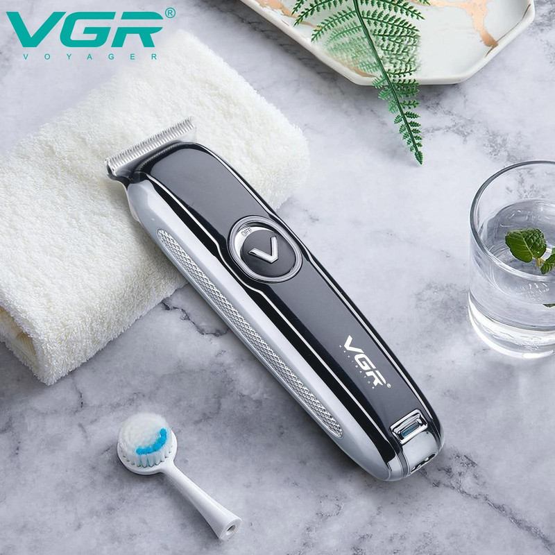 ماشین اصلاح موی بدن و صورت وی جی ار مدل V-168 با تیغه استیل ضد زنگ، طراحی ارگونومیک، شارژ USB، قابلیت تنظیم سرعت و شانه قابل تنظیم دستی