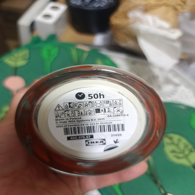 شمع لیوانی معطر ایکیا مدل HOSTAGILLE با رایحه سیب، وانیل زمان اتمام 50 ساعت