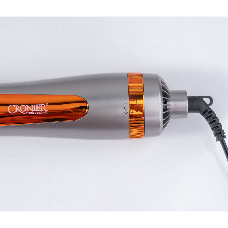 سشوار برس‌دار چرخشی 1200 وات کرونیر مدل CR-6855، موتور AC، وزن 350 گرم، المنت فلز، دارای سری برس‌دار گرد باریک، سری برس‌دار گرد پهن با ویژگی صاف‌کنندگی، حجم‌دهندگی، با قابلیت باد سرد، سیم گردان