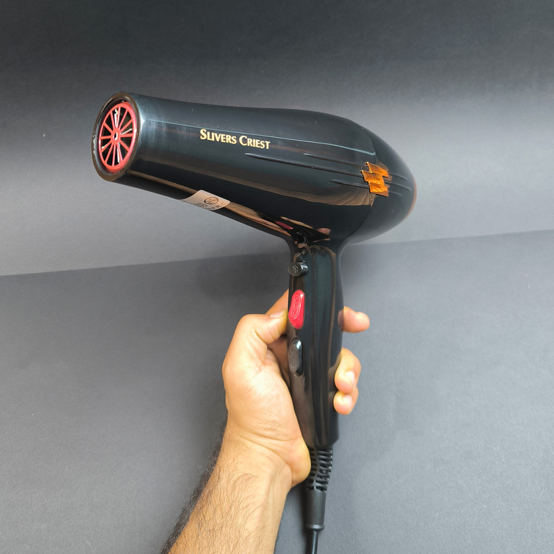 سشوار حرفه‌ای سیلور کرست مدل SC-D014 با موتور AC 3000 وات، فناوری تولید یون، تنظیم دما در 3 حالت و سرعت در 2 حالت، دارای نازل متمرکزکننده و 2 شانه، کابل 1.5 متری و چرخان 360 درجه