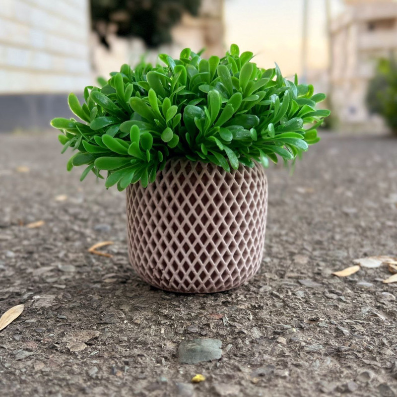 گلدان به همراه گل مصنوعی طرح برگ میخک، مدل زنبوری S52، جنس پودر سنگ و رزین، ابعاد 10×8×12 سانتی‌متر، وزن 300 گرم