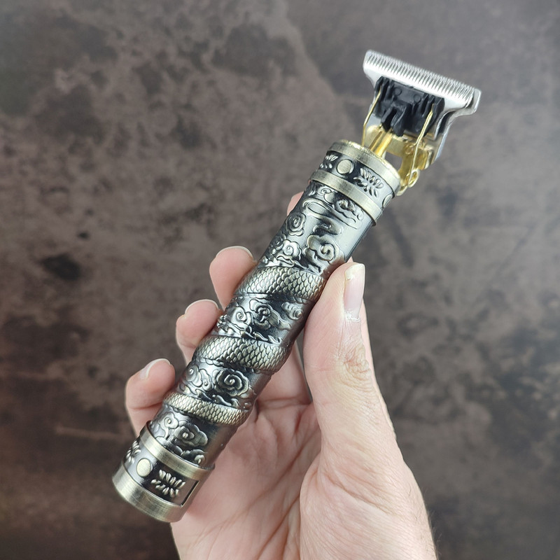 ماشین اصلاح موی سر و صورت تیغه استیل ضدزنگ وینتیج مدل T9 Upgrade plus باتری قابل شارژ با 120 دقیقه شارژدهی، استفاده خشک و مرطوب، خط زن و 4 شانه تنظیم ارتفاع، همراه برس تمیزکننده و روغن مخصوص