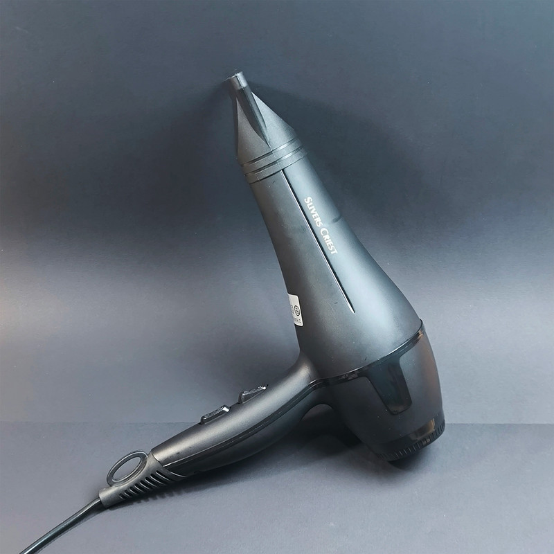 سشوار سیلور کرست مدل SC-D013 با موتور AC، توان 5000 وات، فناوری تولید یون، تنظیم دما و سرعت در 2 حالت و همراه با دیفیوزر و نازل متمرکزکننده