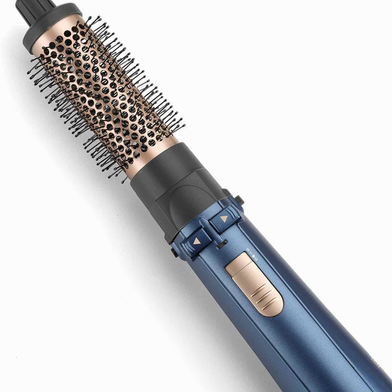سشوار برس‌دار چرخشی 1000 وات بابیلیس مدل Style pro 1000، موتور DC، وزن 280 گرم، المنت سرامیک، دارای سری متمرکز‌کننده باریک با ویژگی صاف‌کنندگی، فرکنندگی، با قابلیت باد سرد، فناوری تولید یون