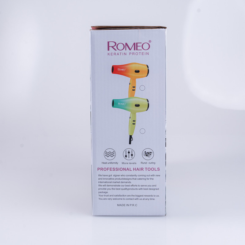 سشوار حرفه‌ای 2200 وات رومئو مدل RM-5151، موتور AC، وزن 682 گرم، دارای سری متمرکز‌کننده باریک با ویژگی صاف‌کنندگی، با قابلیت باد سرد، فناوری تولید یون