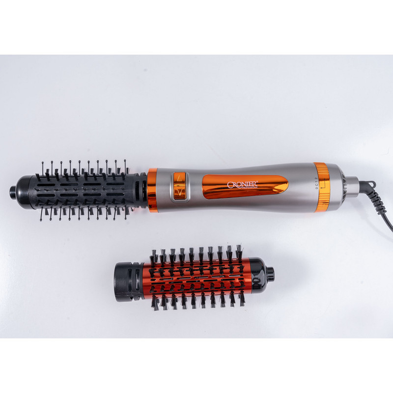 سشوار برس‌دار چرخشی 1200 وات کرونیر مدل CR-6855، موتور AC، وزن 350 گرم، المنت فلز، دارای سری برس‌دار گرد باریک، سری برس‌دار گرد پهن با ویژگی صاف‌کنندگی، حجم‌دهندگی، با قابلیت باد سرد، سیم گردان