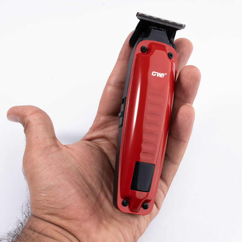 ماشین اصلاح موی سر و صورت جی دبلیو مدل GW-9979، اصلاح به صورت صفر زن، خط زن، منبع انرژی باتری، تکنولوژی اصلاح به صورت تریمر، مدت زمان شارژ 120 دقیقه و مدت زمان استفاده پس از شارژ 120 دقیقه، به همراه کابل شارژ، برس تمیزکننده، روغن، 4 عدد شانه، عملکرد توربو