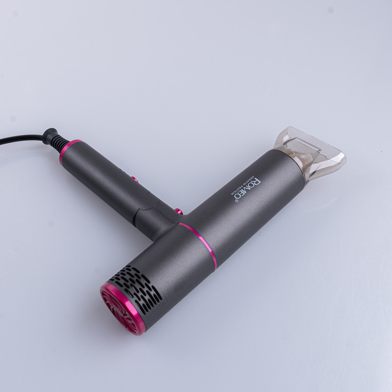 سشوار حرفه‌ای 2000 وات رومئو مدل RM-5656، موتور AC، وزن 600 گرم، المنت سرامیک تورمالین، دارای سری متمرکز‌کننده باریک با ویژگی صاف‌کنندگی، با قابلیت باد سرد