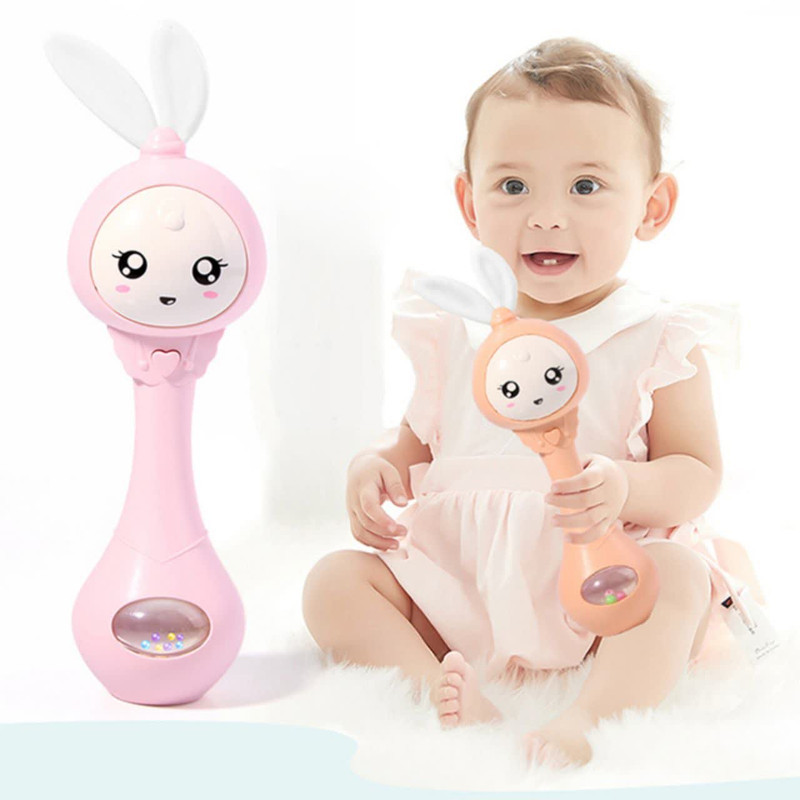جغجغه ناب سل مدل دستی دندان گیر چراغدار موزیکال خرگوش بامزه  کد Funny rabbit teething hand rattle