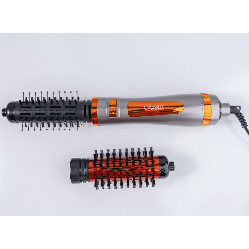 سشوار برس‌دار چرخشی 1200 وات کرونیر مدل CR-6855، موتور AC، وزن 350 گرم، المنت فلز، دارای سری برس‌دار گرد باریک، سری برس‌دار گرد پهن با ویژگی صاف‌کنندگی، حجم‌دهندگی، با قابلیت باد سرد، سیم گردان