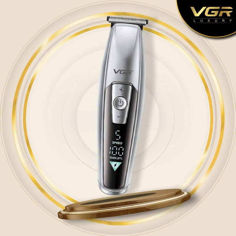 ماشین اصلاح موی سر و صورت وی جی ار مدل V-970 با تیغه استیل ضد زنگ، باتری قابل شارژ با 240 دقیقه استفاده، 5 سرعت قابل تنظیم، طراحی ارگونومیک و 3 شانه تنظیم طول 2، 3 و 4 میلی‌متر