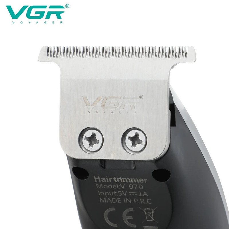 ماشین اصلاح موی سر و صورت وی جی ار مدل V-970 با تیغه استیل ضد زنگ، باتری قابل شارژ با 240 دقیقه استفاده، 5 سرعت قابل تنظیم، طراحی ارگونومیک و 3 شانه تنظیم طول 2، 3 و 4 میلی‌متر
